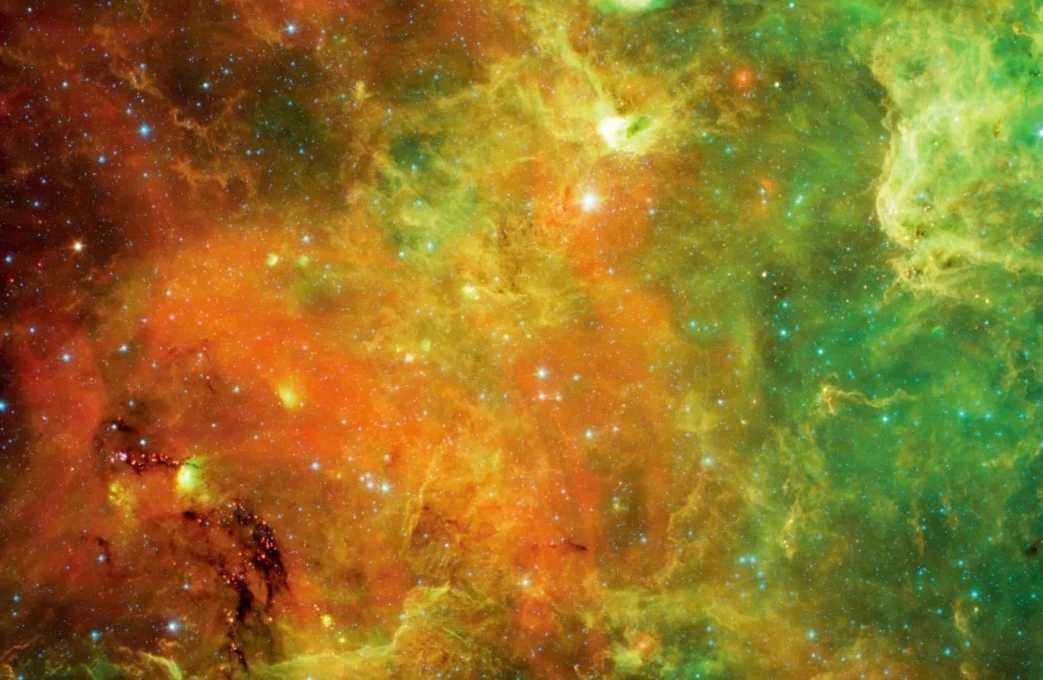 Spitzer’s Infrared View Unveils the Hidden Depths of the North America Nebula (NGC 7000)
