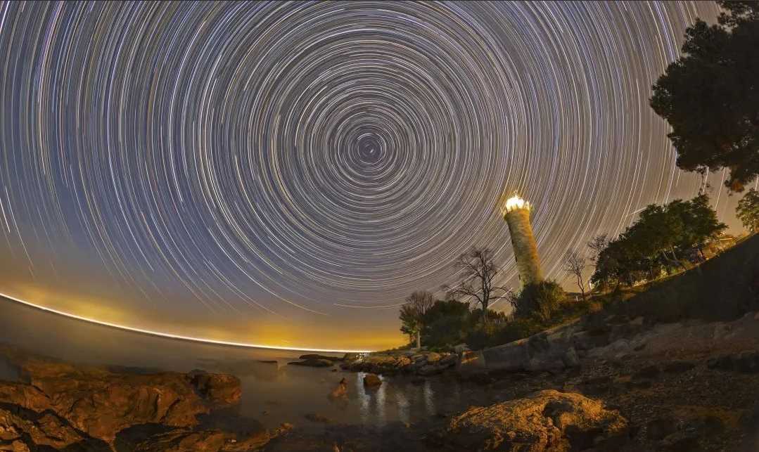 Savudrija Lighthouse and Celestial Star Trails: A Timeless Navigation Portrait