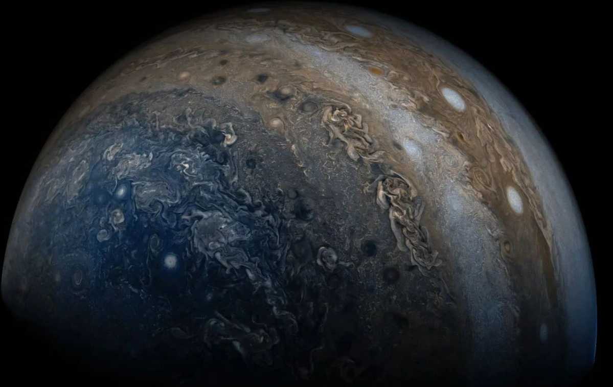Jupiter’s Cosmic Wonders Unveiled by Juno: From Swirling Clouds to a Mysterious Core